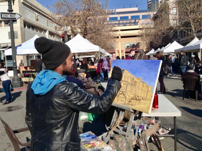 Artist painting at Old Oakland market